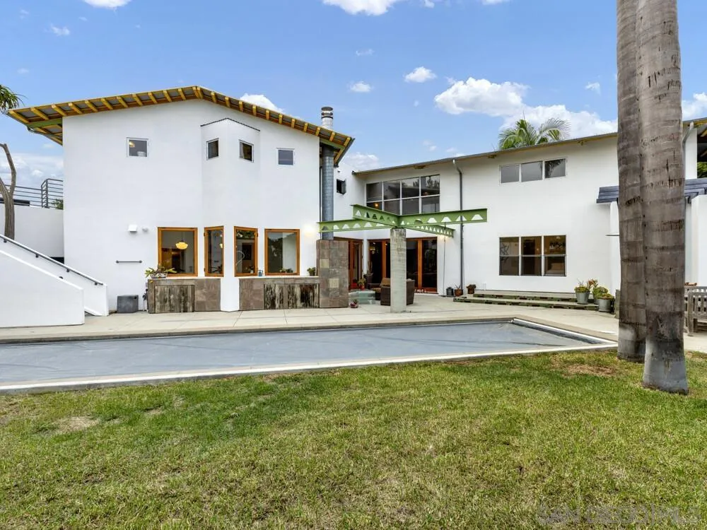 778 Ramona Place Del Mar, CA 92014 - Photo 60 of 72 a view of a house with a swimming pool and sitting area