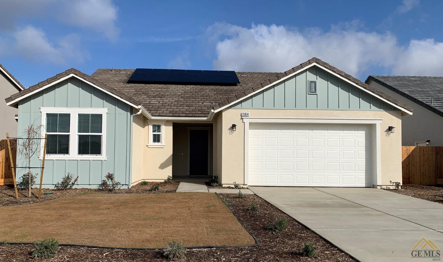 Undisclosed Address Bakersfield, CA 93314 - Photo 1 of 8 a front view of a house with a yard