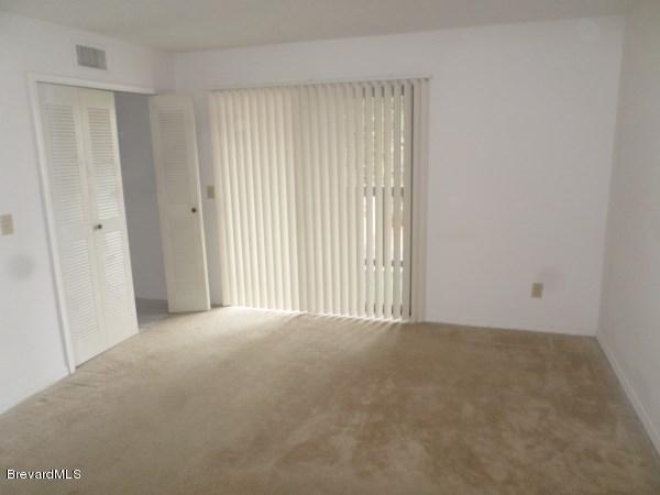7667 North Wickham Road, Unit 609 Melbourne, FL 32940 - Photo 5 of 10 Master Bedroom