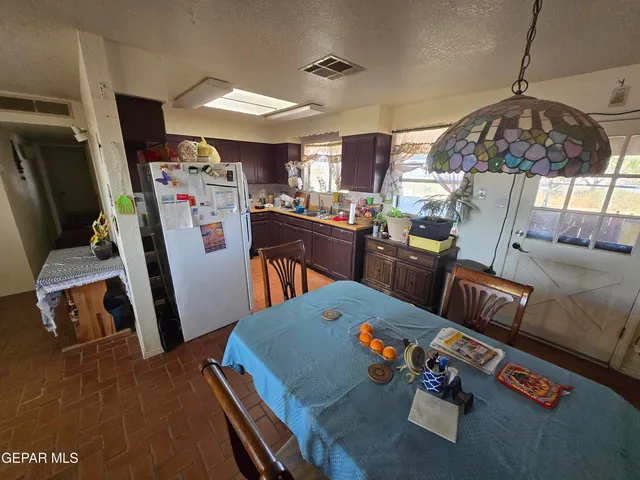 a dining room with furniture and a table