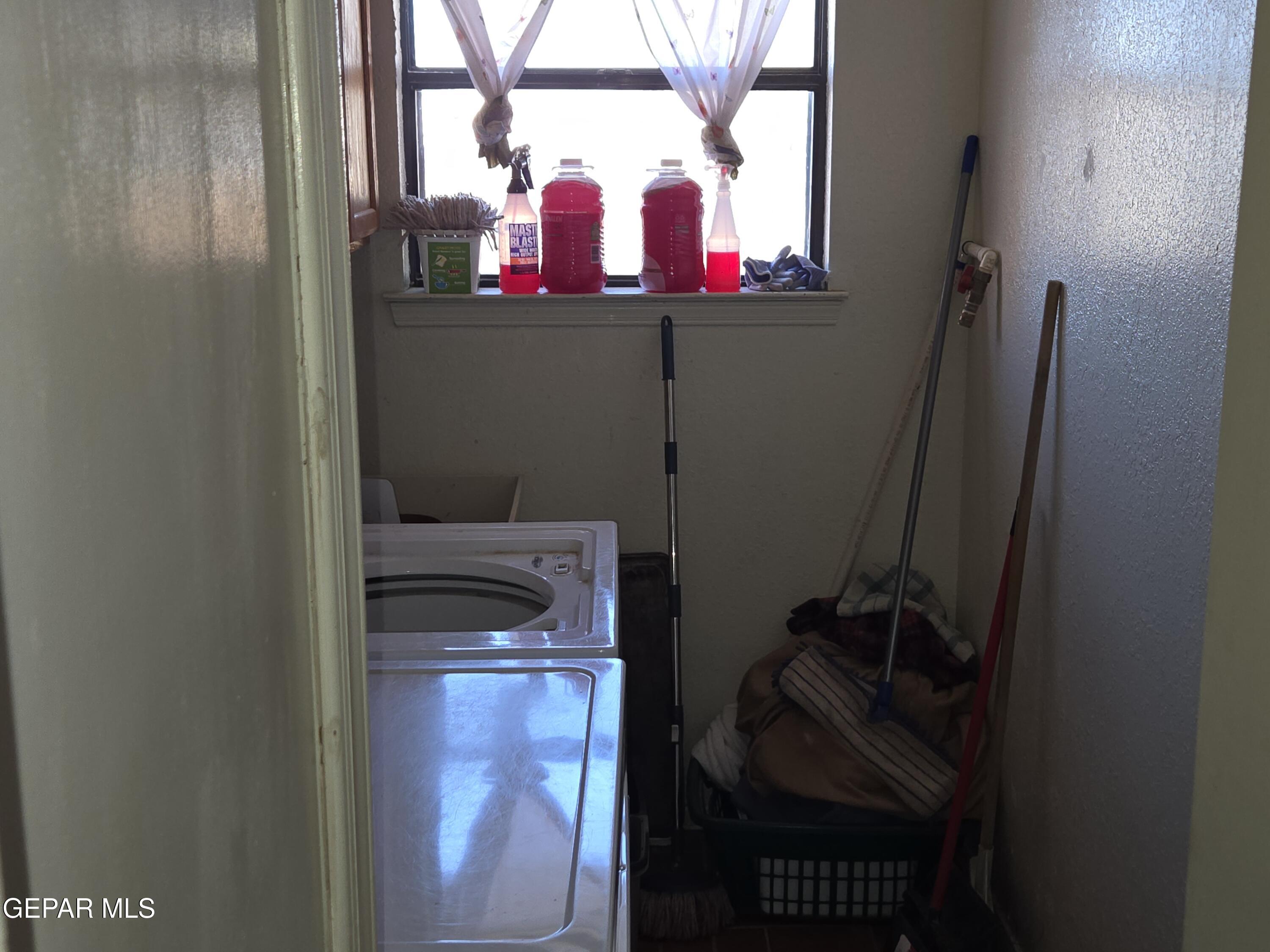 625 Tumbleweed Road Chaparral, NM 88081 - Photo 13 of 17 a bathroom with a sink and a mirror