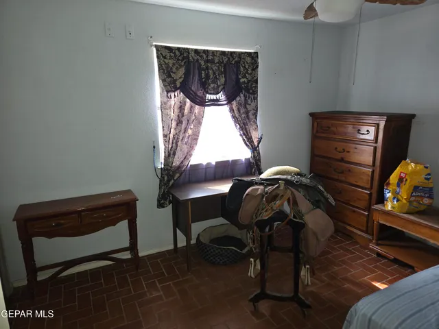 a room with furniture and a window