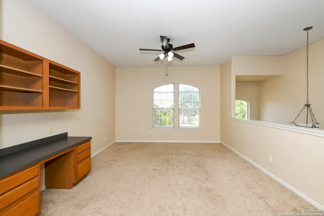 an empty room with windows