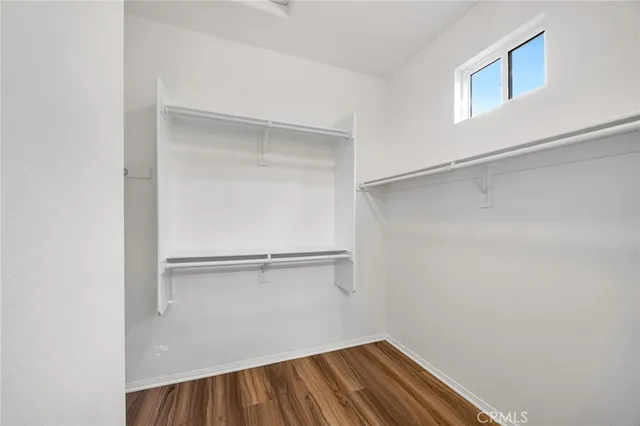 a view of an empty walk in closet