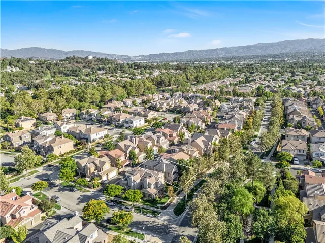 an aerial view of a city with lots of residential buildings