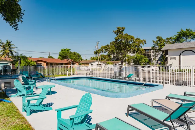 a view of a swimming pool with a patio
