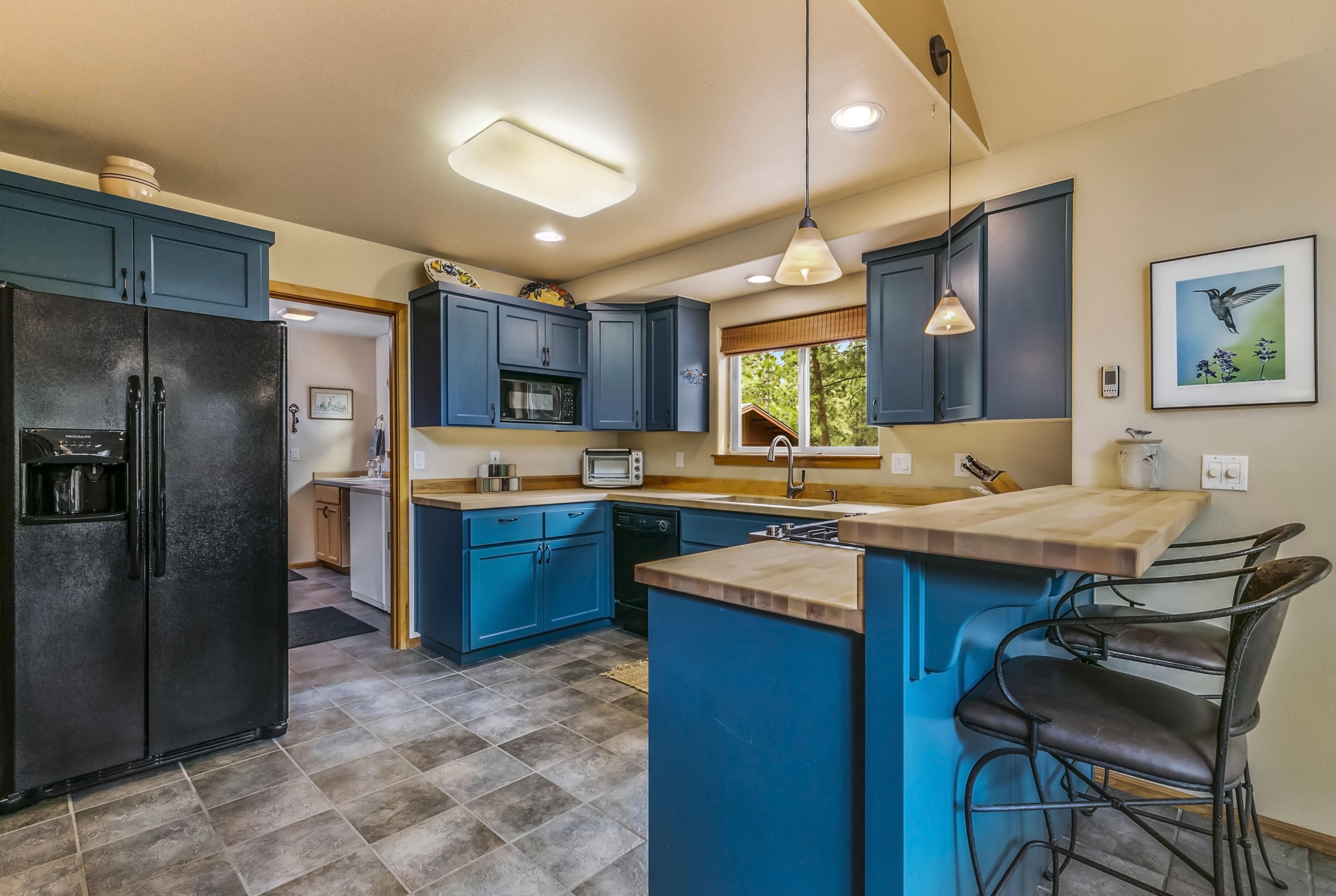 19537 East Campbell Road Bend, OR 97702 - Photo 11 of 29 Updated kitchen with newer fridge & gas range
