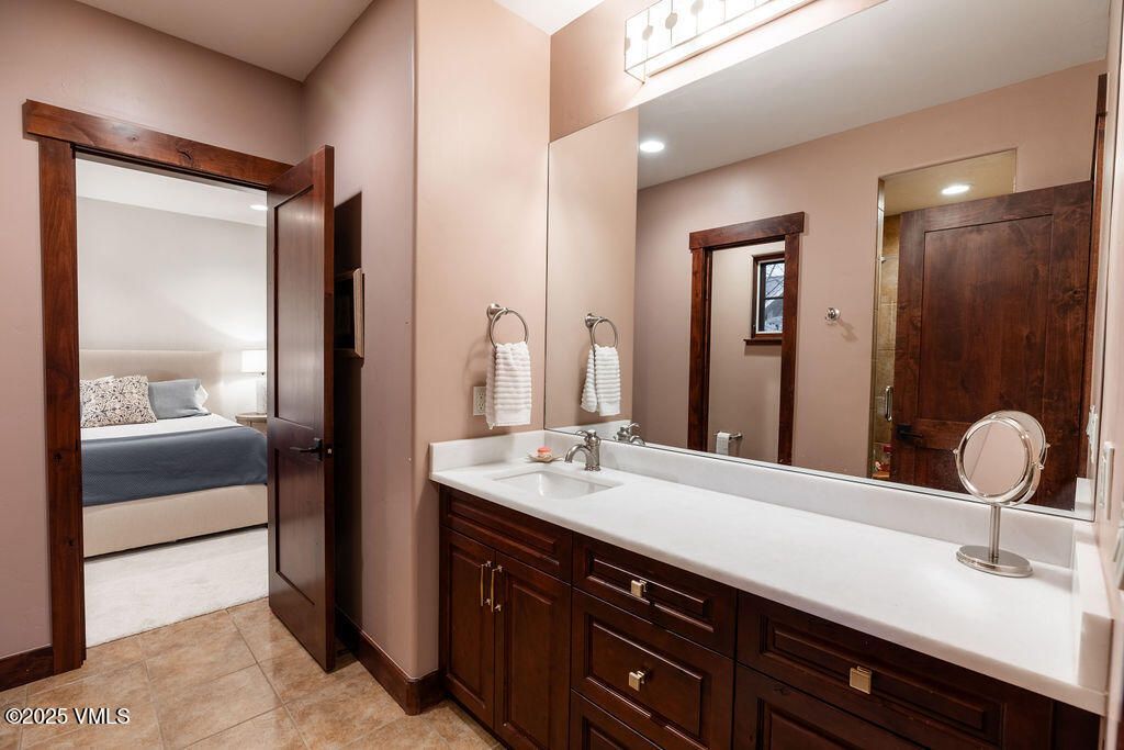170 Palmer Loop Eagle, CO 81631 - Photo 16 of 37 a bathroom with a sink and a mirror