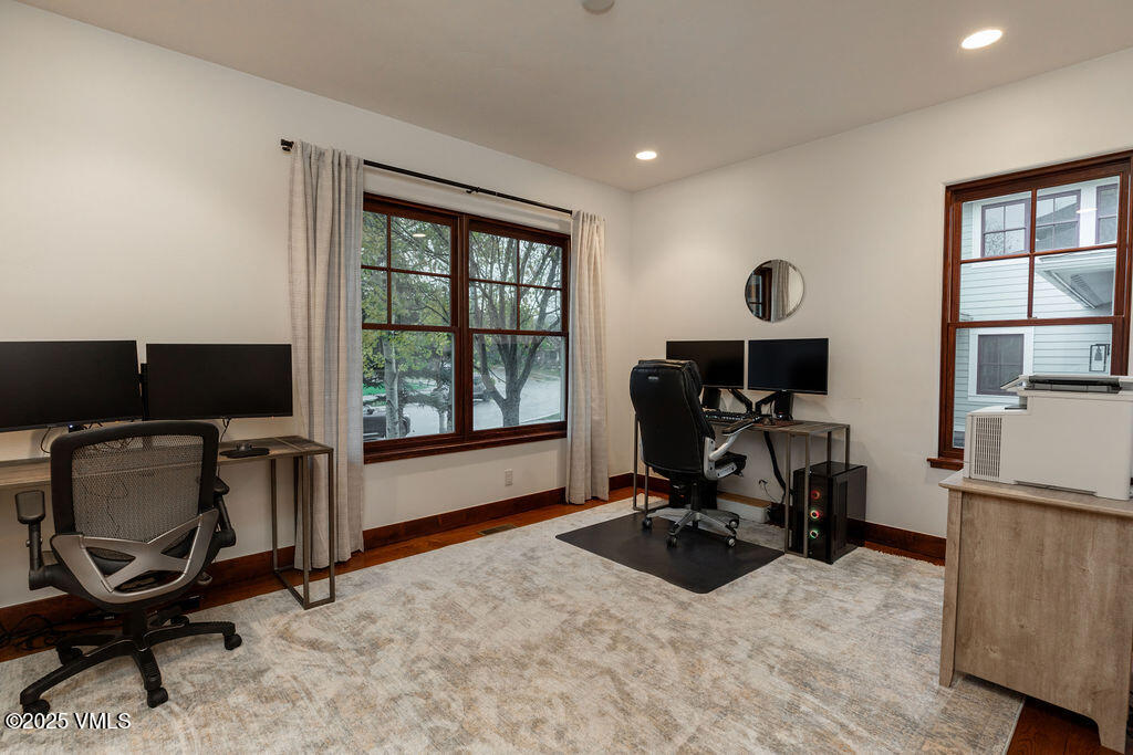 170 Palmer Loop Eagle, CO 81631 - Photo 18 of 37 a view of a workspace with furniture and a window
