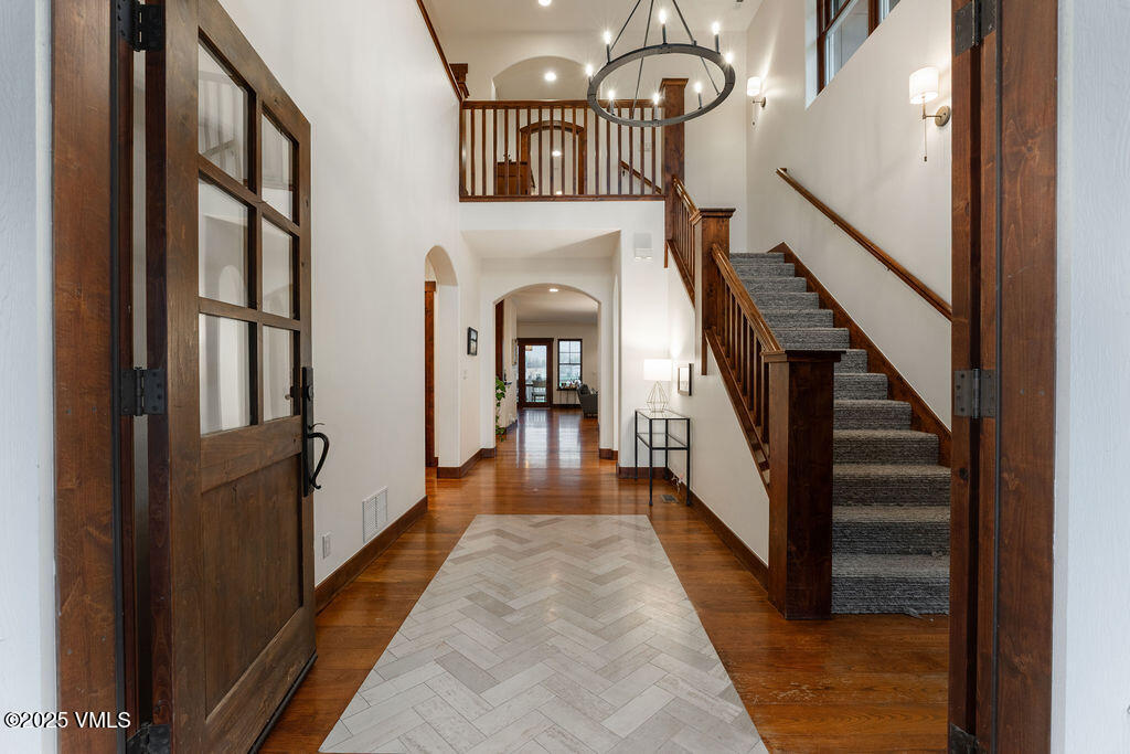 170 Palmer Loop Eagle, CO 81631 - Photo 2 of 37 a view of entryway and hall with wooden floor