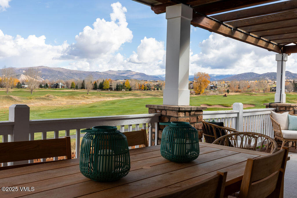 170 Palmer Loop Eagle, CO 81631 - Photo 29 of 37 a view of a balcony with mountain view and wooden floor