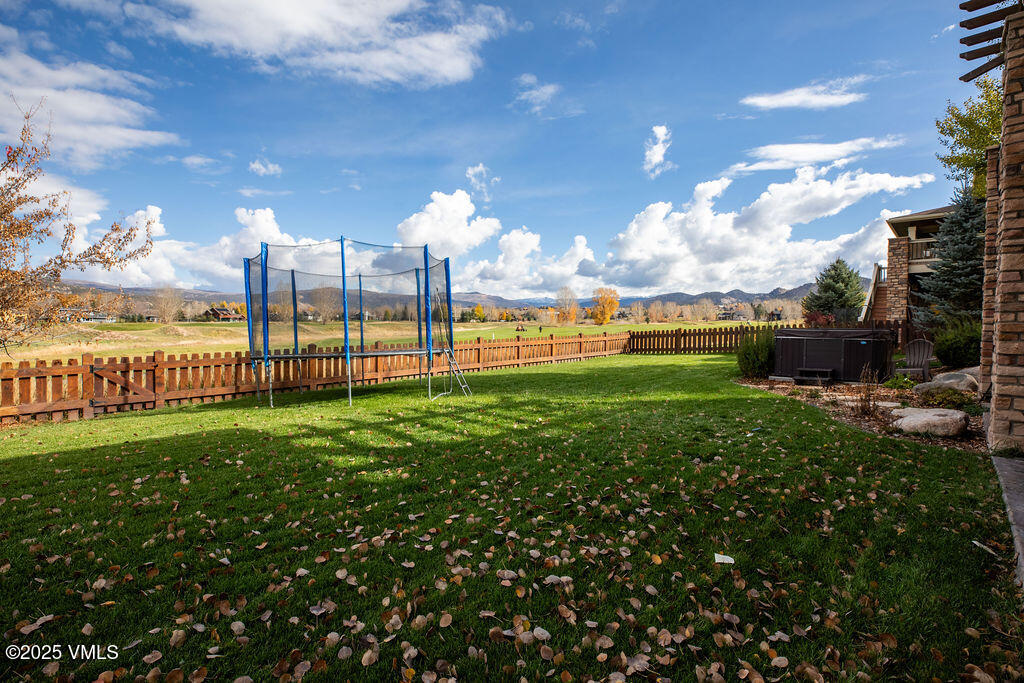 170 Palmer Loop Eagle, CO 81631 - Photo 32 of 37 a view of a golf course with a lake