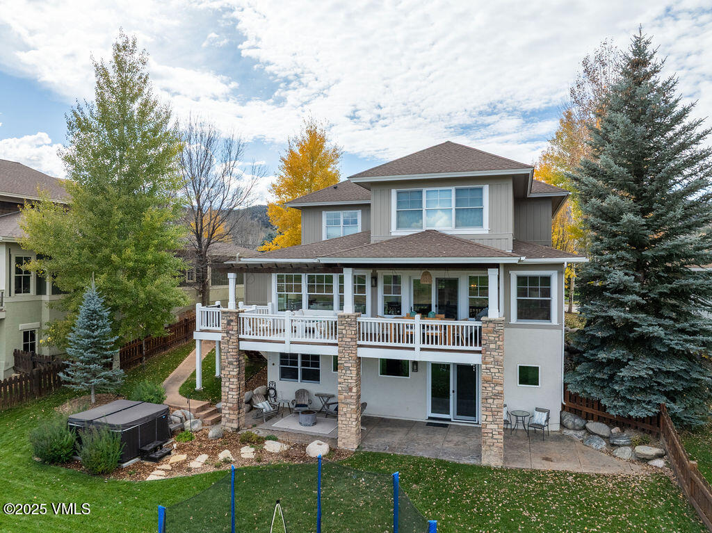 170 Palmer Loop Eagle, CO 81631 - Photo 33 of 37 a view of a big house with a big yard and large trees