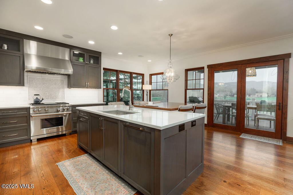 170 Palmer Loop Eagle, CO 81631 - Photo 6 of 37 a large kitchen with a stove and a sink