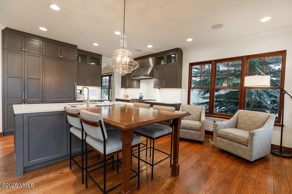 170 Palmer Loop Eagle, CO 81631 - Photo 7 of 37 a view of a dining room with furniture window and wooden floor
