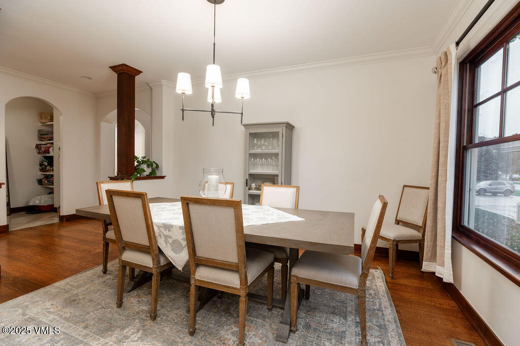 170 Palmer Loop Eagle, CO 81631 - Photo 10 of 37 a view of a dining room with furniture window and wooden floor