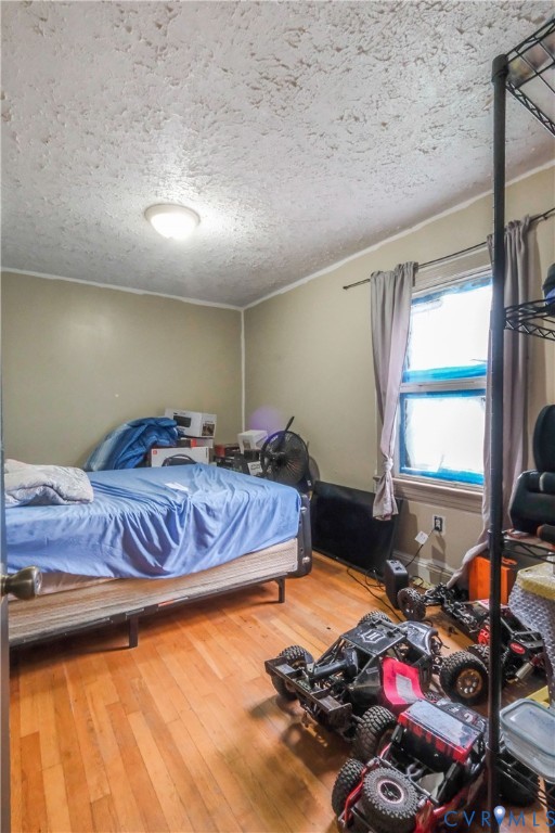 3331 South Constitution Route Dillwyn, VA 23936 - Photo 13 of 24 Bedroom with hardwood / wood-style flooring and a