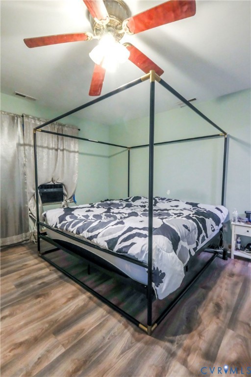 3331 South Constitution Route Dillwyn, VA 23936 - Photo 15 of 24 Bedroom with dark wood-style flooring and a ceilin