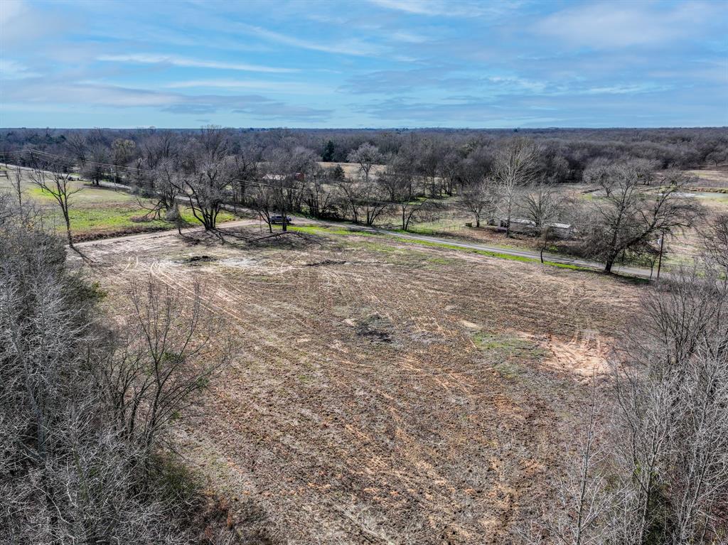 705 County Road 2437 Como, TX 75431 - Photo 11 of 16 a view of a field with an outdoor space
