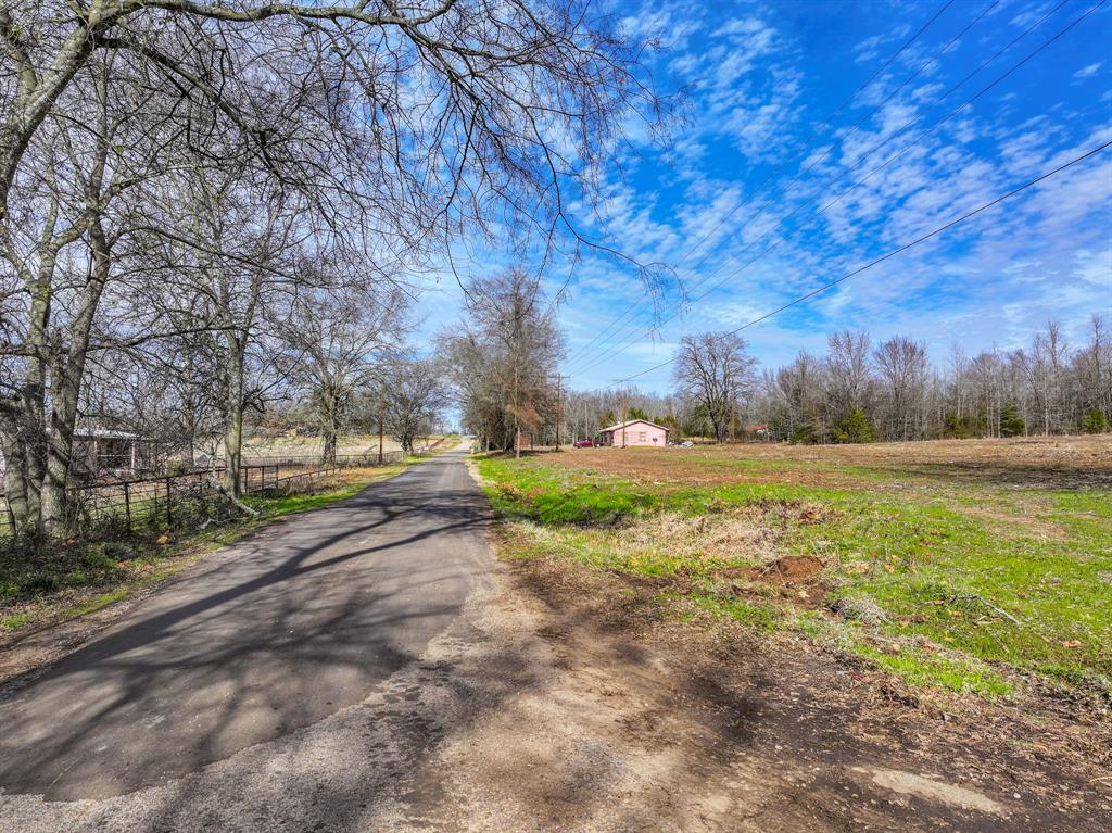 705 County Road 2437 Como, TX 75431 - Photo 14 of 16 a view of a yard with an outdoor space