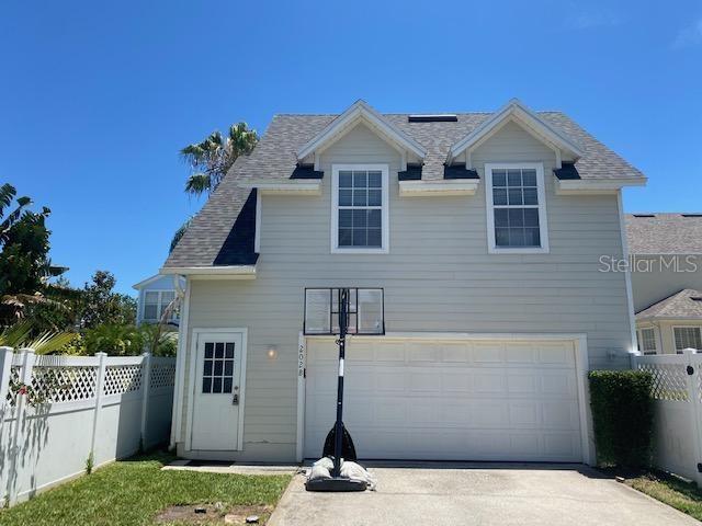202 Reserve Place, Unit B Celebration, FL 34747 - Photo 1 of 1 a front view of a house with a yard