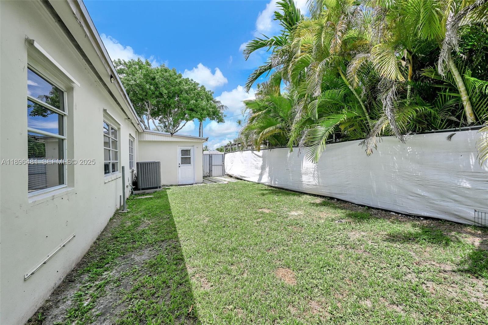 9740 Cutler Ridge Drive Cutler Bay, FL 33157 - Photo 18 of 21 a view of a back yard of the house