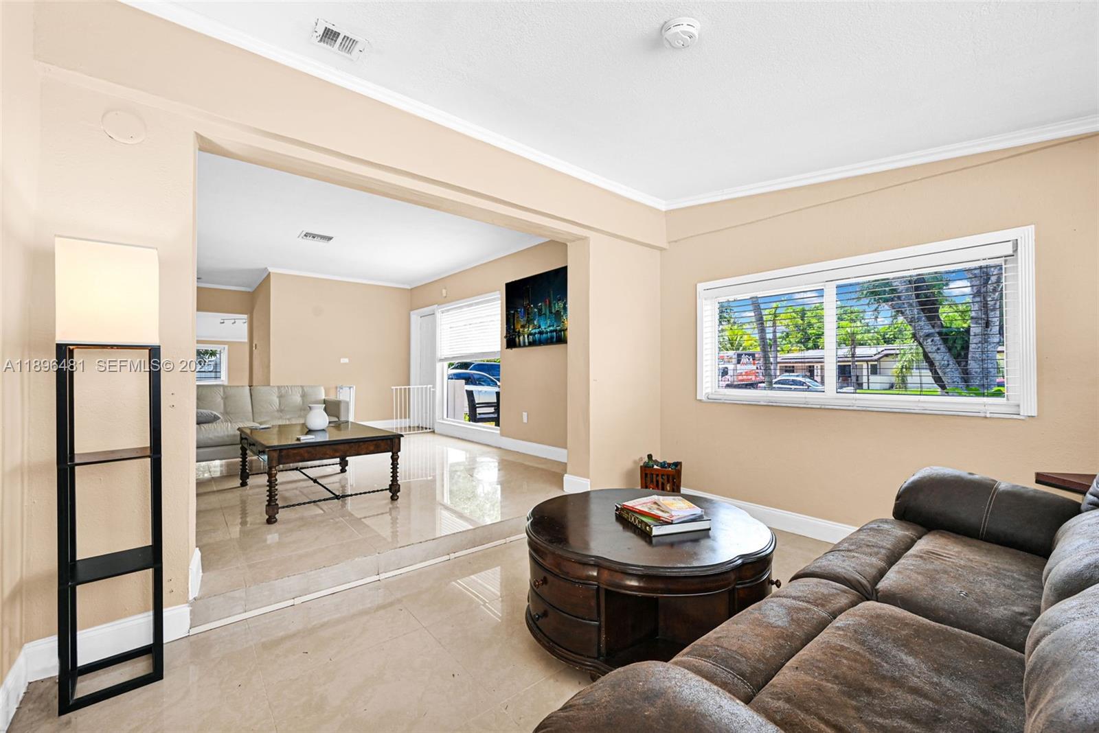 9740 Cutler Ridge Drive Cutler Bay, FL 33157 - Photo 4 of 21 a living room with furniture and a window