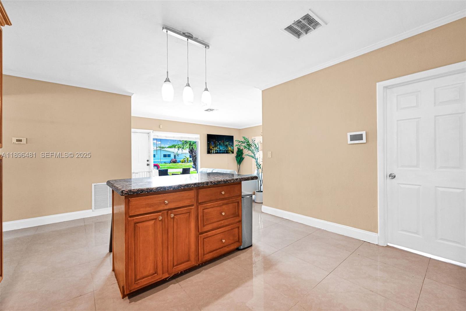 9740 Cutler Ridge Drive Cutler Bay, FL 33157 - Photo 9 of 21 a kitchen with granite countertop a sink and cabinets