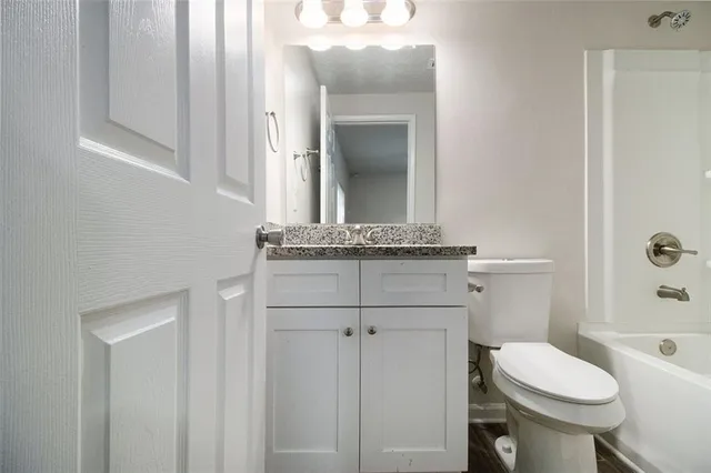a bathroom with a sink and a toilet