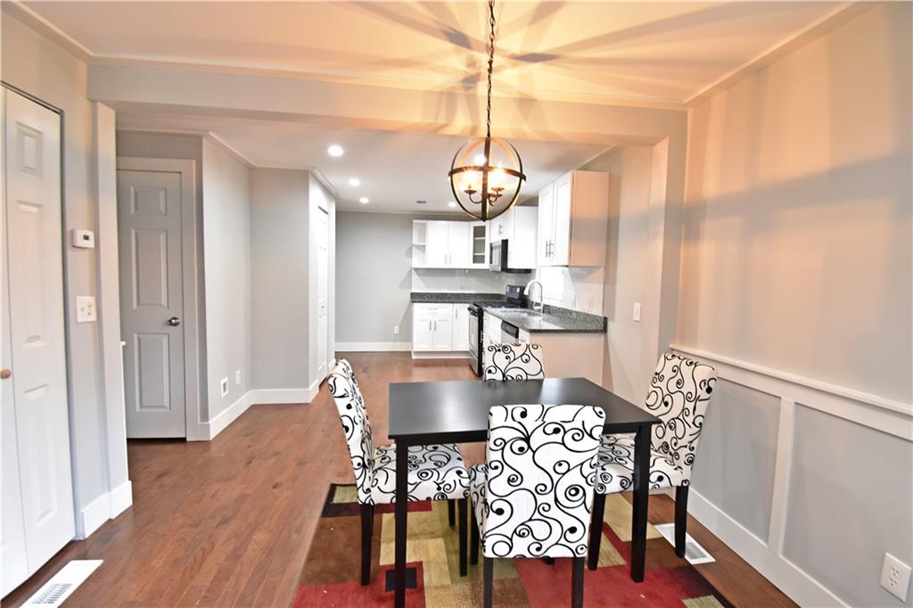 140 Klir Road Pittsburgh, PA 15209 - Photo 9 of 25 Dining room that opens to kitchen. All new flooring, recessed lighting and dry wall.