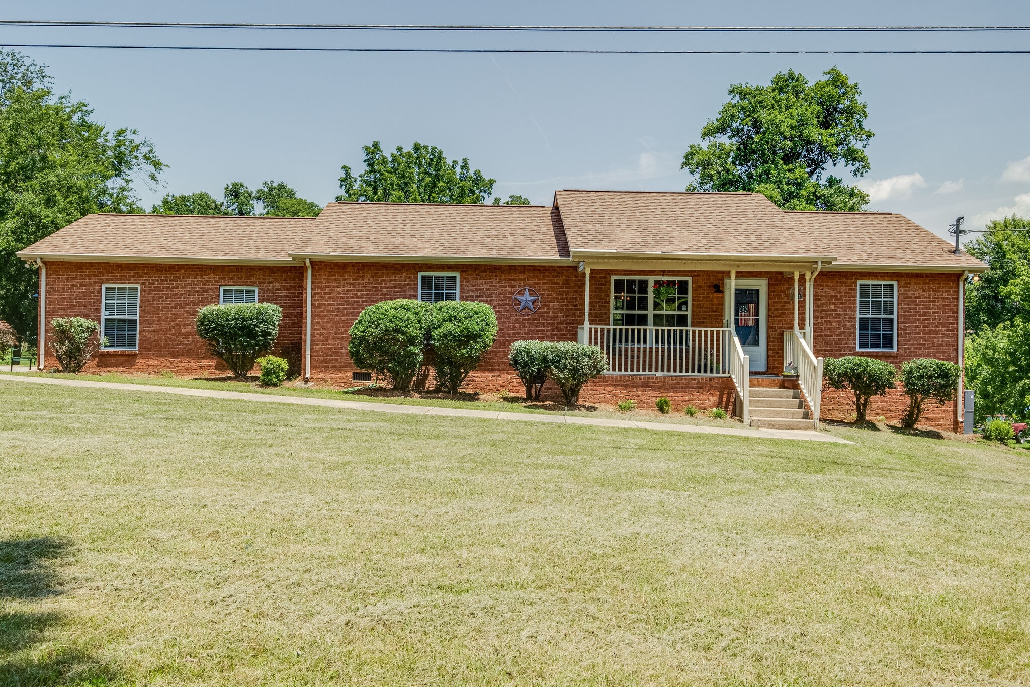 353 Beckwith Road Mount Juliet, TN 37122 - Photo 1 of 26 a house view with a garden space