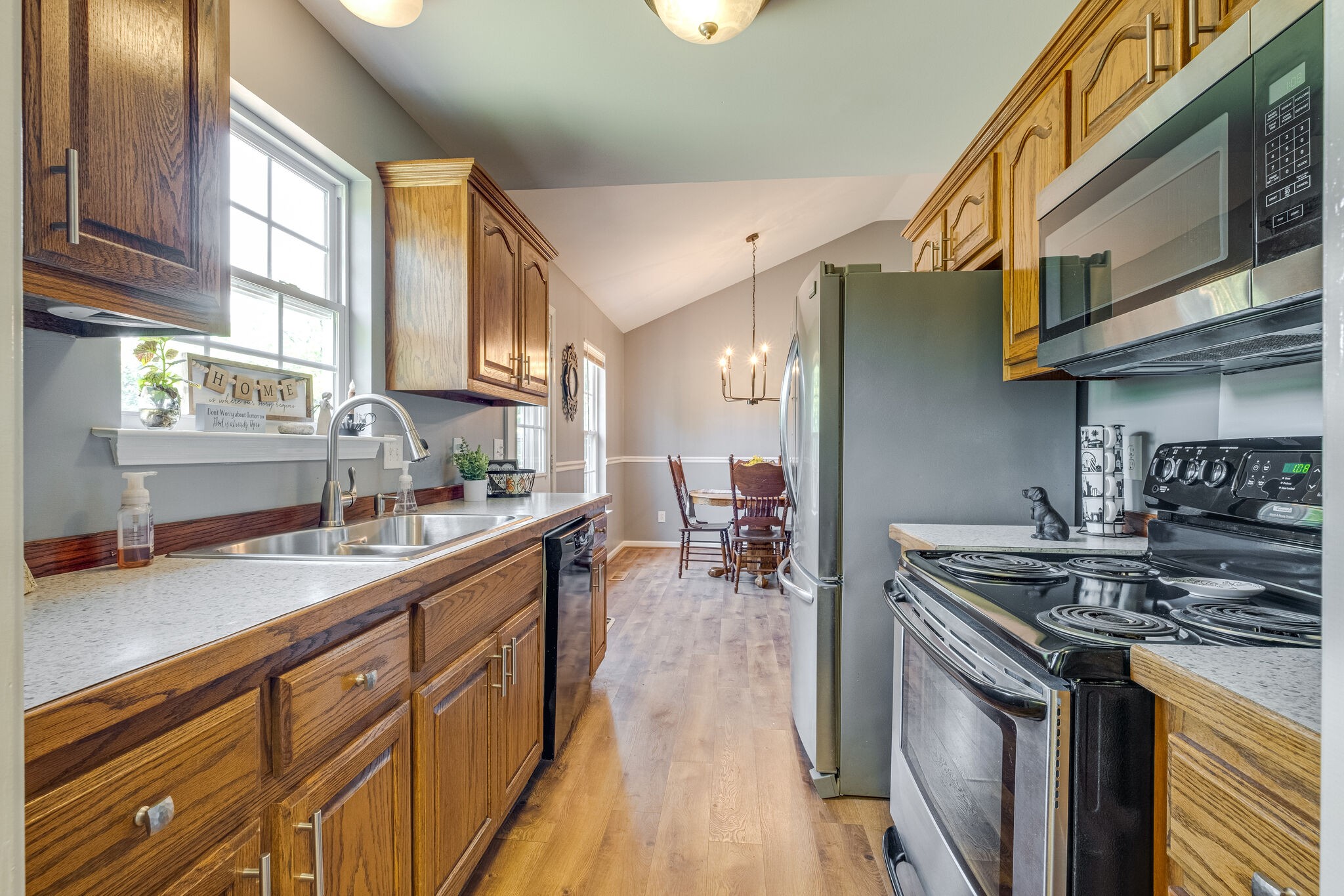 353 Beckwith Road Mount Juliet, TN 37122 - Photo 15 of 26 a kitchen with stainless steel appliances granite countertop a sink stove and cabinets