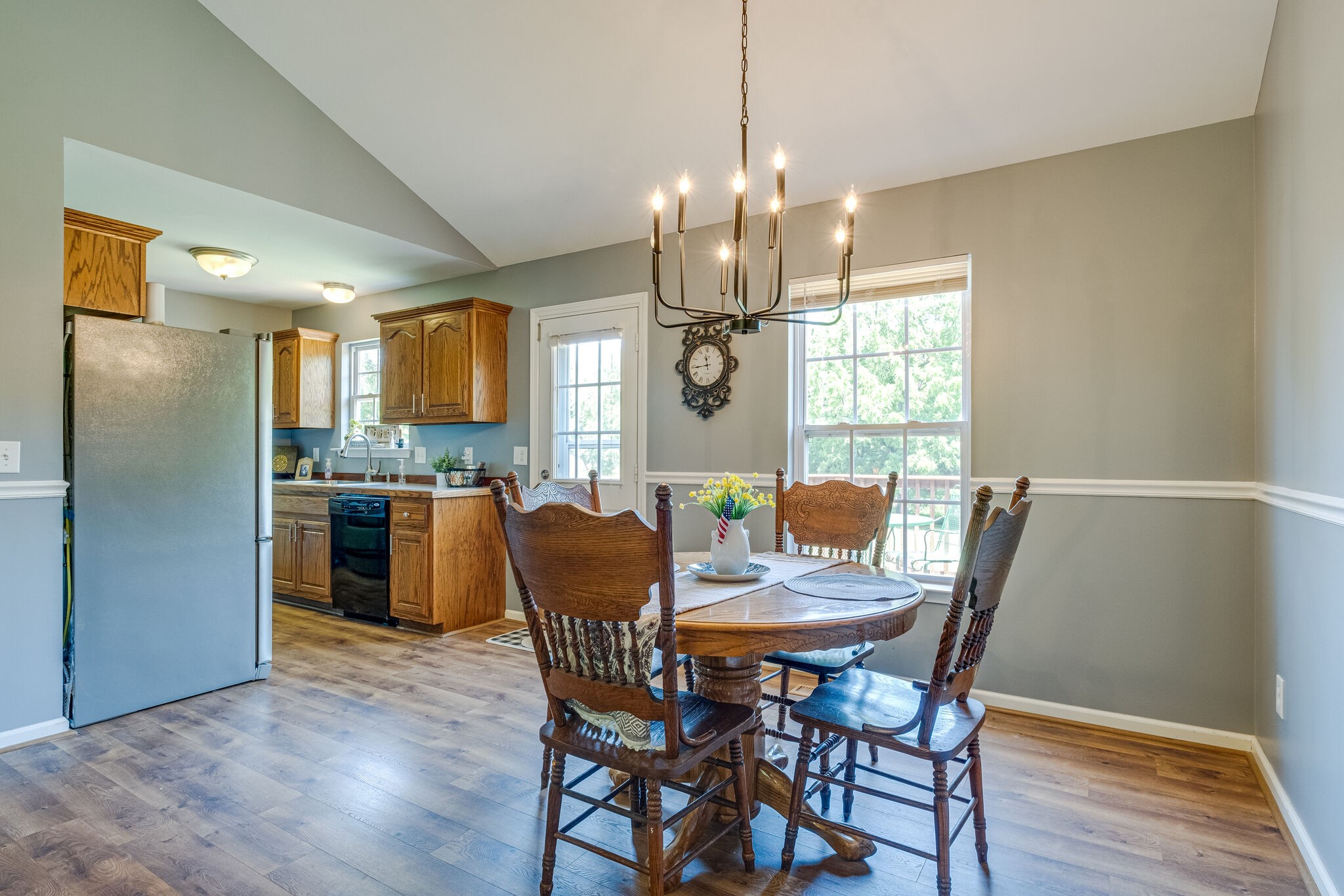 353 Beckwith Road Mount Juliet, TN 37122 - Photo 20 of 26 a view of a dining room with furniture window and wooden floor