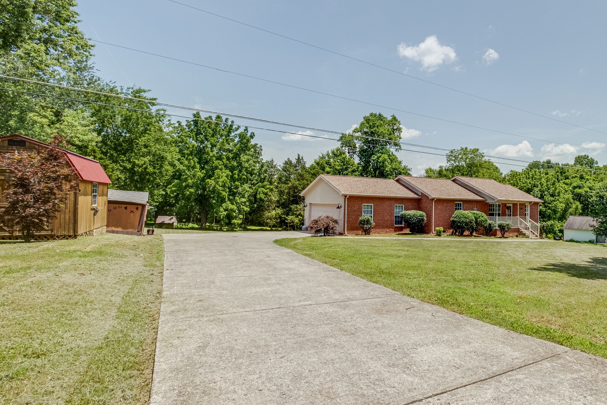 353 Beckwith Road Mount Juliet, TN 37122 - Photo 4 of 26 a view of a house with a garden