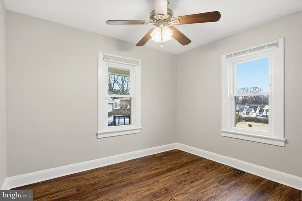 a bathroom with a sink toilet and vanity