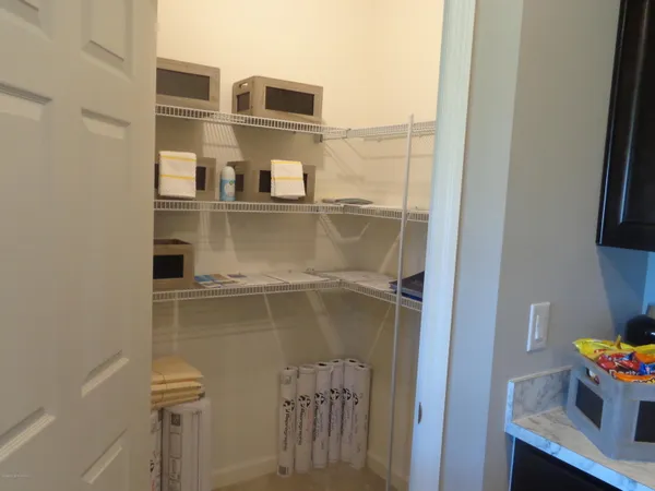 a view of storage and utility room