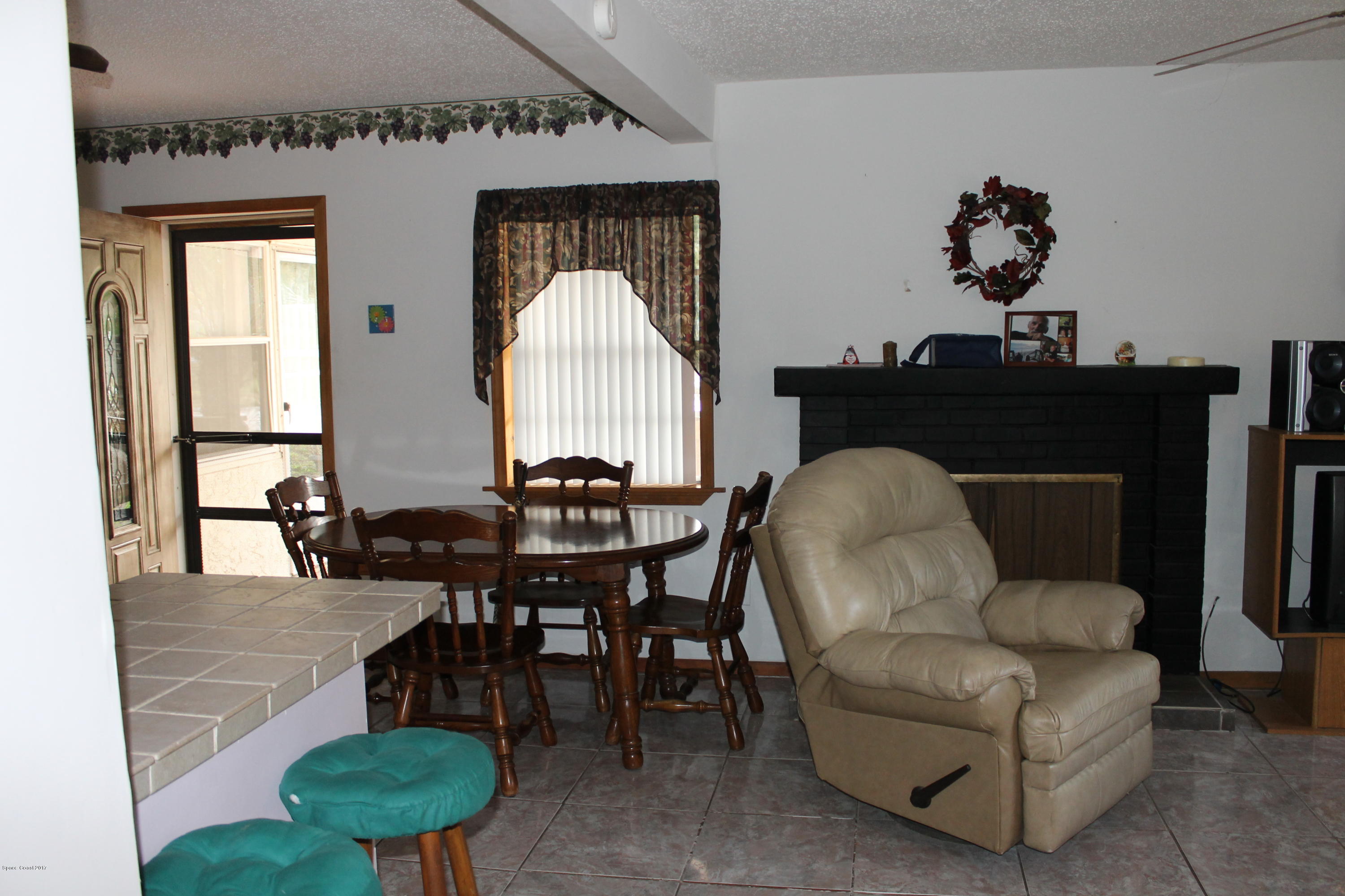 3575 Carter Road Mims, FL 32754 - Photo 27 of 30 living room fireplace