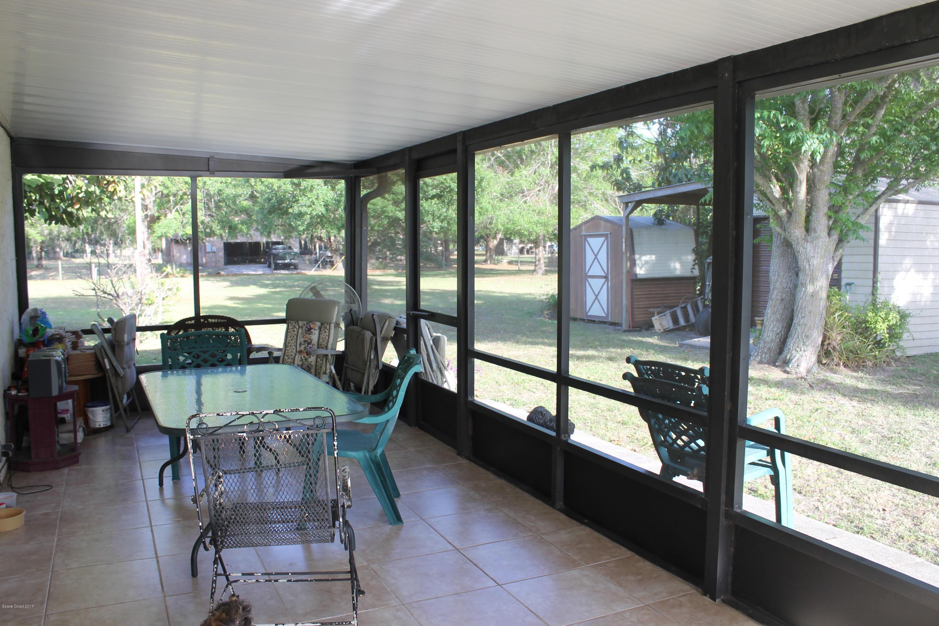 3575 Carter Road Mims, FL 32754 - Photo 4 of 30 Large Screened Porch