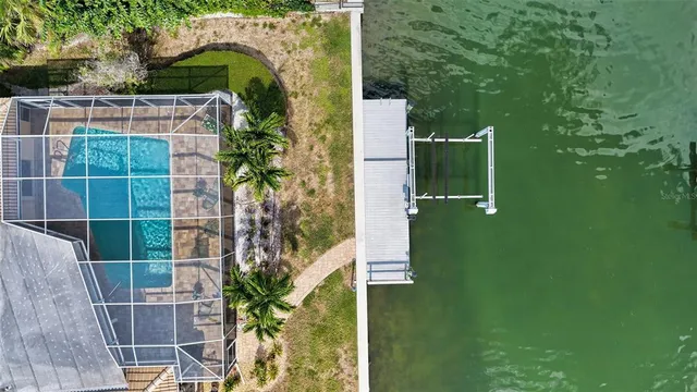 a view of a swimming pool with a patio