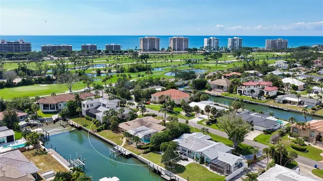 a aerial view of a house with a lake view