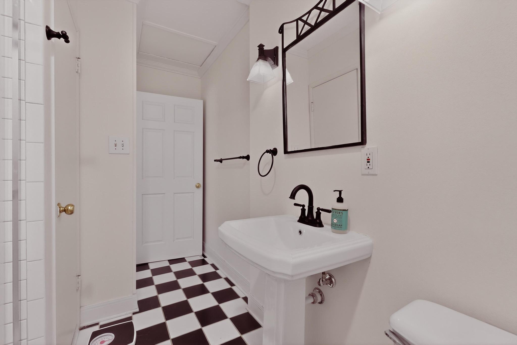 1906 Collier Street Austin, TX 78704 - Photo 24 of 40 a bathroom with a sink toilet and shower