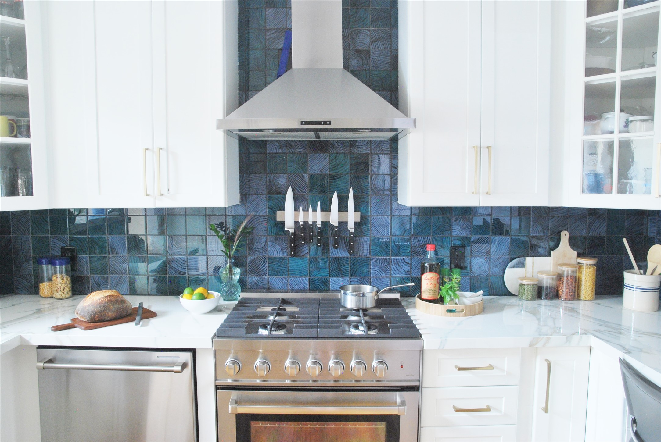 1906 Collier Street Austin, TX 78704 - Photo 5 of 40 a kitchen with a stove and cabinets