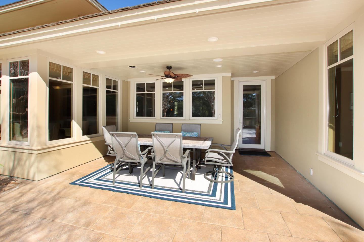120 Edenvale Road Watsonville, CA 95076 - Photo 31 of 68 a view of a patio with table and chairs