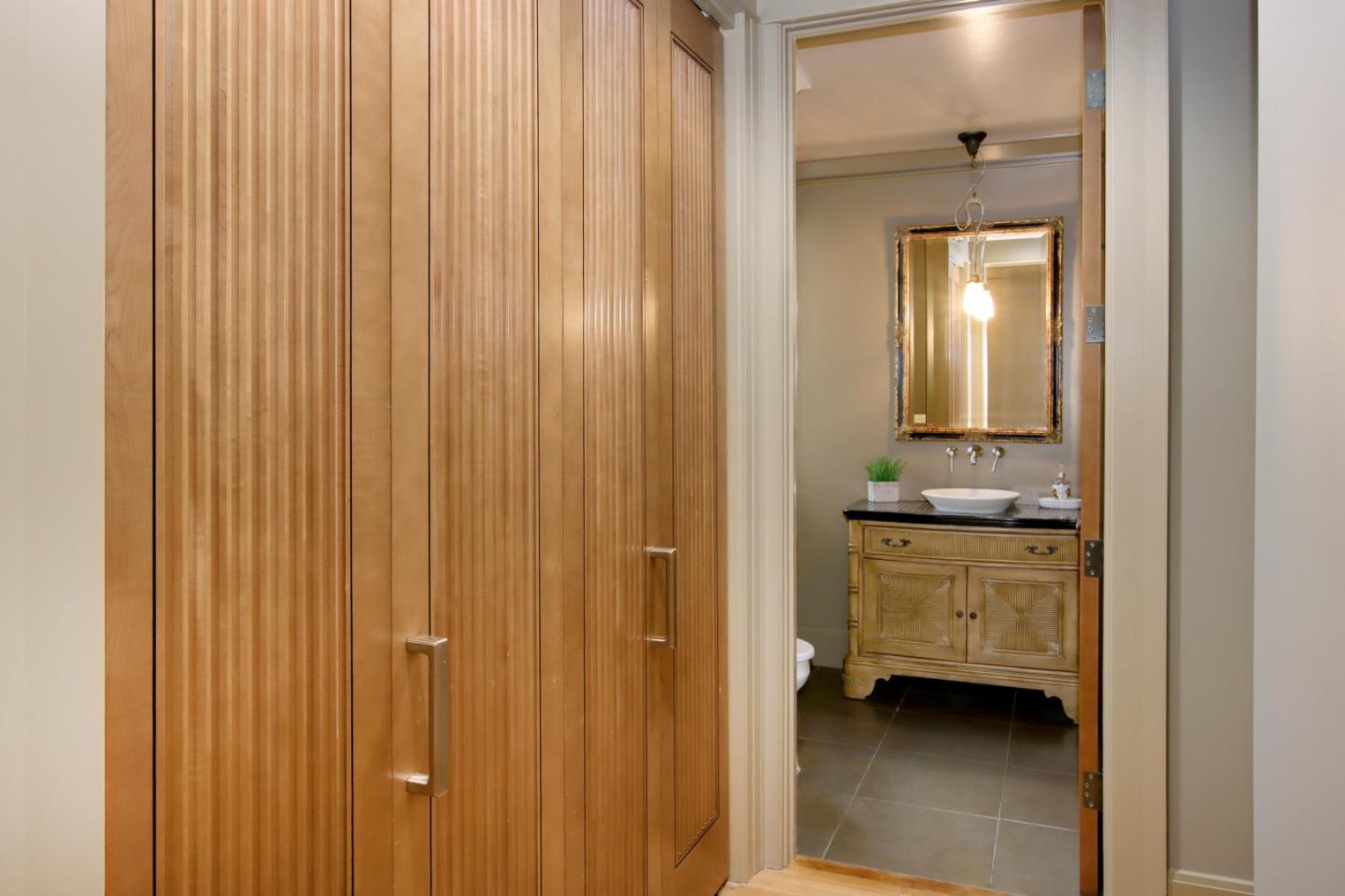 120 Edenvale Road Watsonville, CA 95076 - Photo 60 of 68 a view of a bathroom with a sink and a mirror