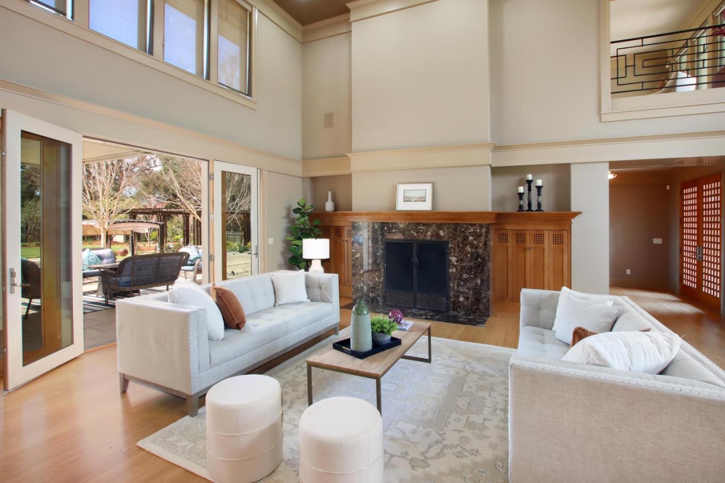 120 Edenvale Road Watsonville, CA 95076 - Photo 10 of 68 a living room with furniture a fireplace and a large window