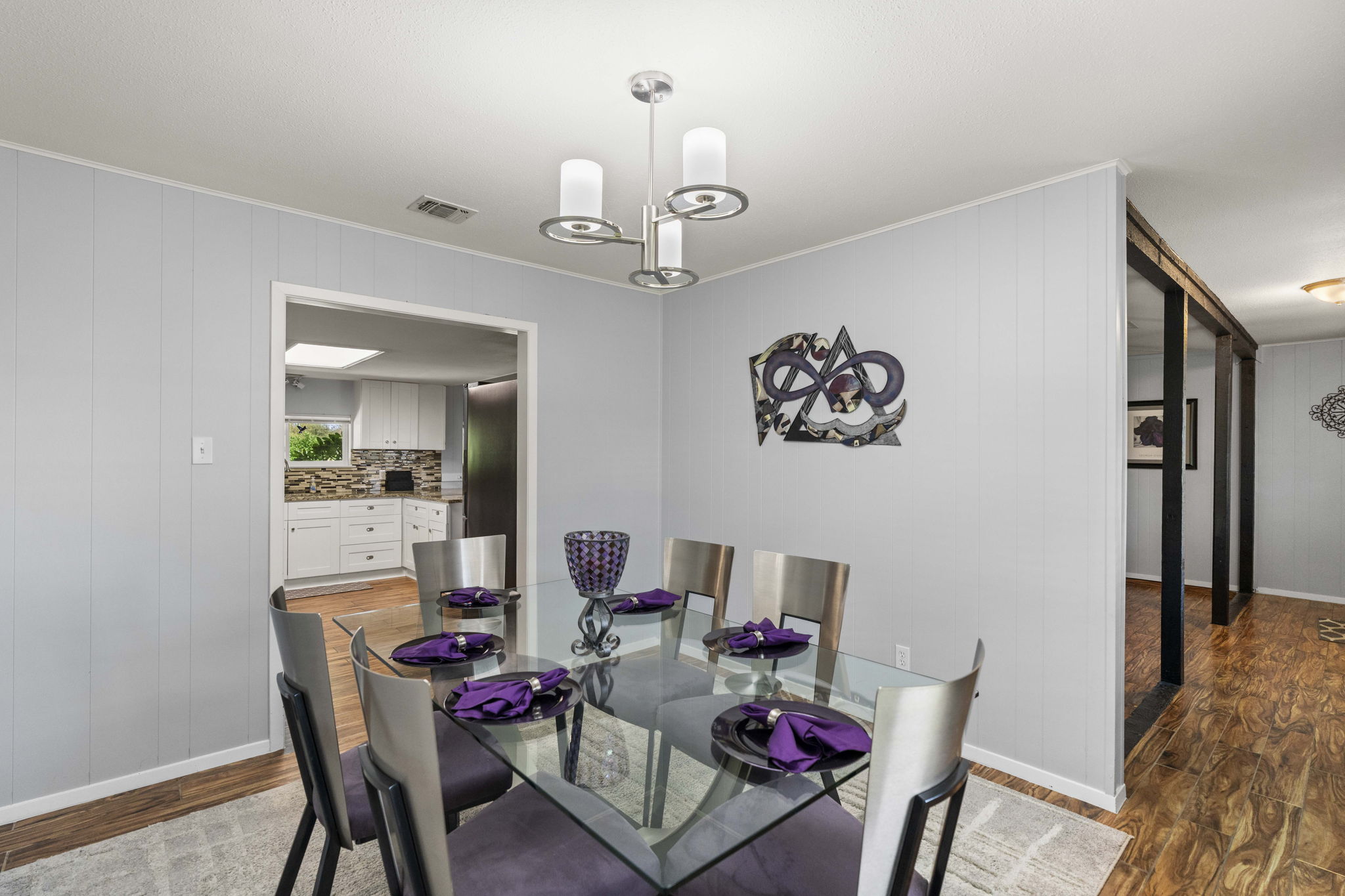 130 Hy Road Buda, TX 78610 - Photo 11 of 32 Dining area. Kitchen to left, living room and front door to the right.