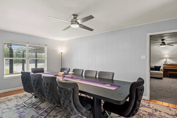 a view of a dining room with furniture