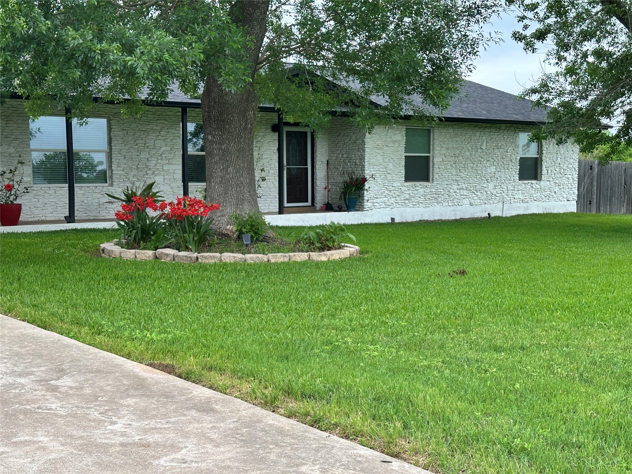 130 Hy Road Buda, TX 78610 - Photo 2 of 32 siding and roof with shingles
