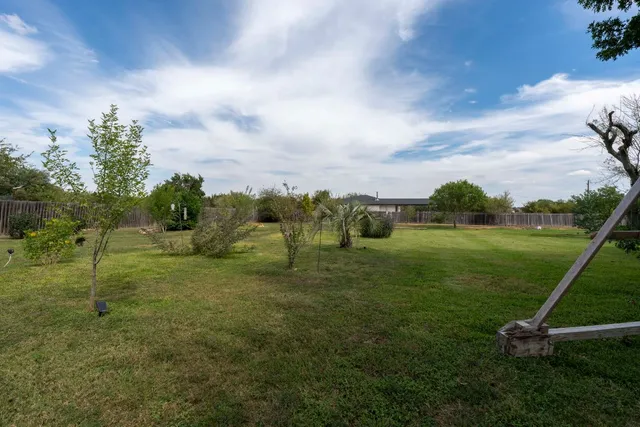 a view of a garden with an outdoor space
