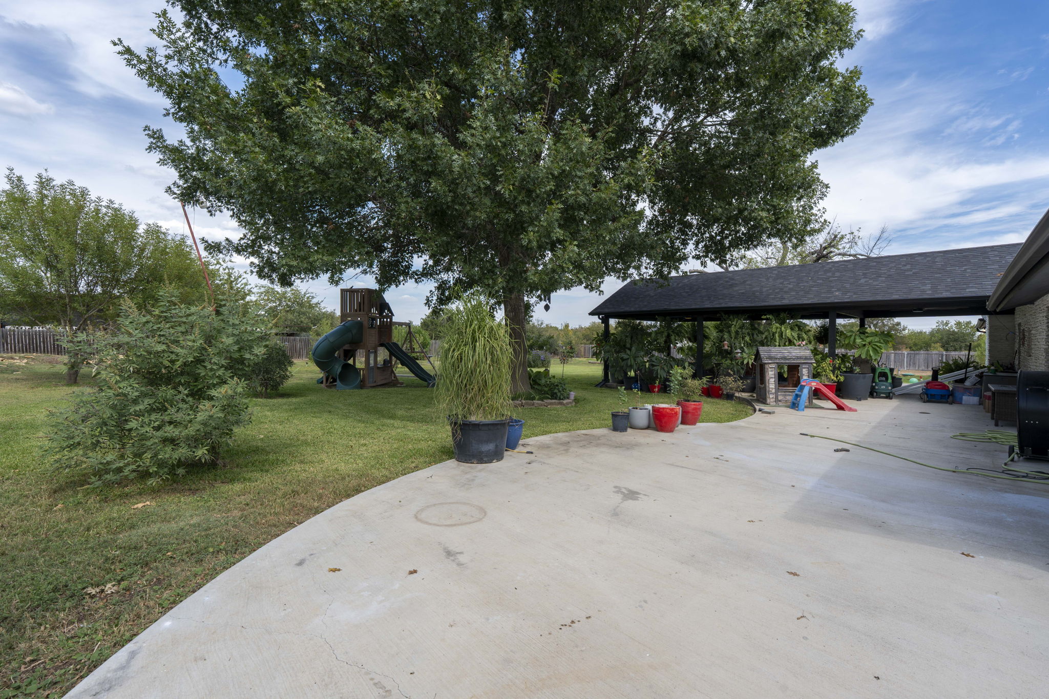 130 Hy Road Buda, TX 78610 - Photo 27 of 32 View of patio / terrace featuring a playground